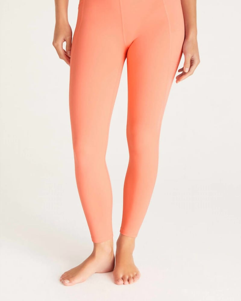 Front of a model wearing a size Large Women'S All Day 7/8 Pocket Legging In Bright Melon in Bright Melon by Z Supply. | dia_product_style_image_id:357012